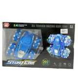 Packaged blue toy car with LED lights on a black background
