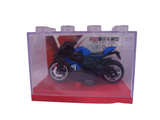 Toy motorcycle model in clear packaging with a red base